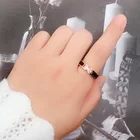 Titanium Ring Fashion Rose Gold Inlaid Titanium Steel 4 Diamond Drip Ring