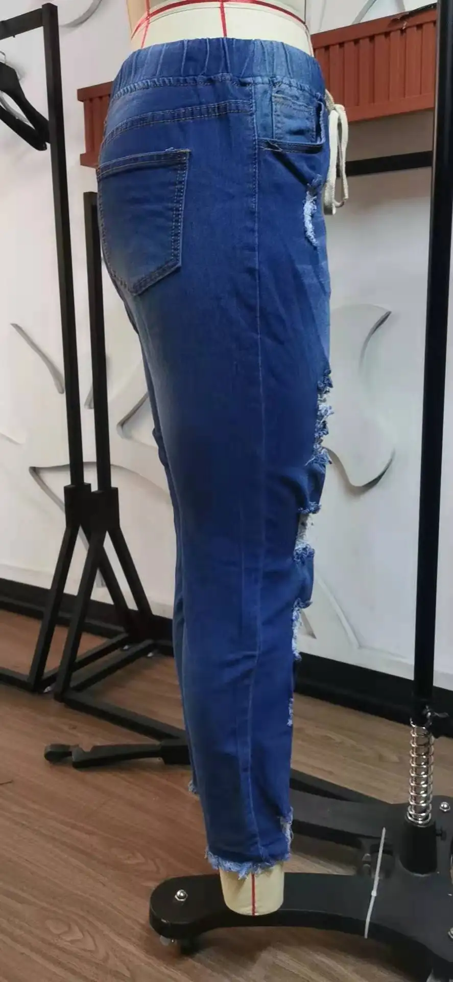 New Arrivals Plus Size Mid Waist Casual Washed Skinny Blue Denim Pencil Pants Ripped Distressed Women's Jeans supplier