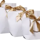 Paper Bag Handle Customizable Customized Kraft Paper Bag Packaging Bag Wholesale Clothing Paper Bag With Handle