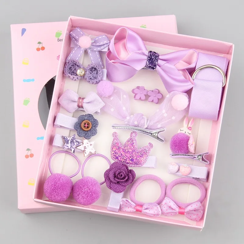 Hair clips in a box. Purple hair pins set