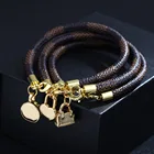 2021 New PU Striped Leather Bracelet Amazon Hot Style Copper Buckle Plated Gold Round Lock Bag Bracelet