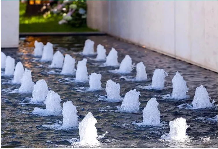 High Quality Modern Outdoor Water Fountain Jet with Dancing Bubble Geyser Nozzles Stainless and Stone Material for Garden Use manufacture