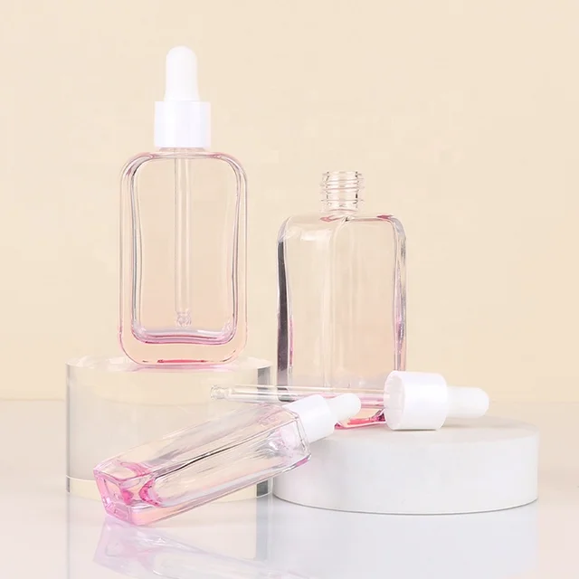 2 oz 60ml Clear Pink Glass Essential Oil Packaging container Square dropper bottle for Eye Cream and Hair Care Oil.