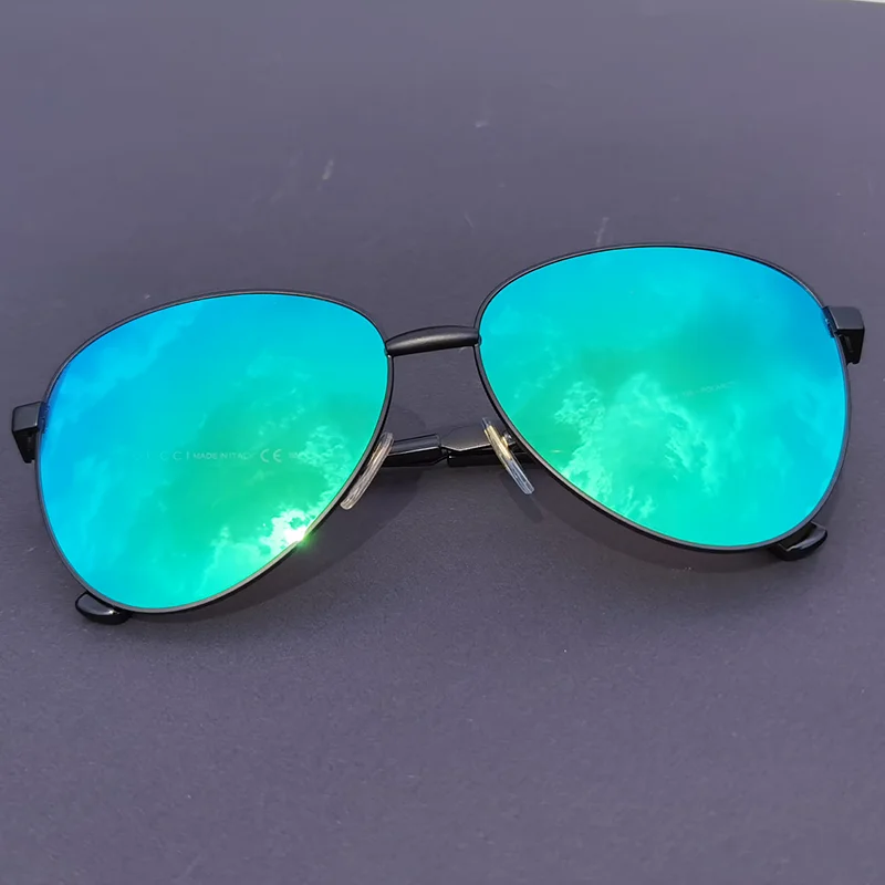 green reflective sunglasses
