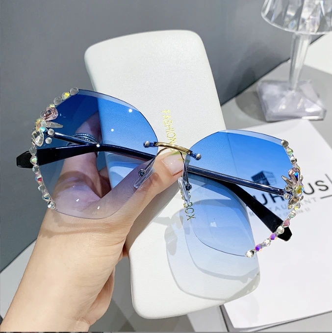 High Quality Fashion UV400 Protection Driving Round Sunglasses Diamond Rimless Rhinestone Resin Sunglasses for Women