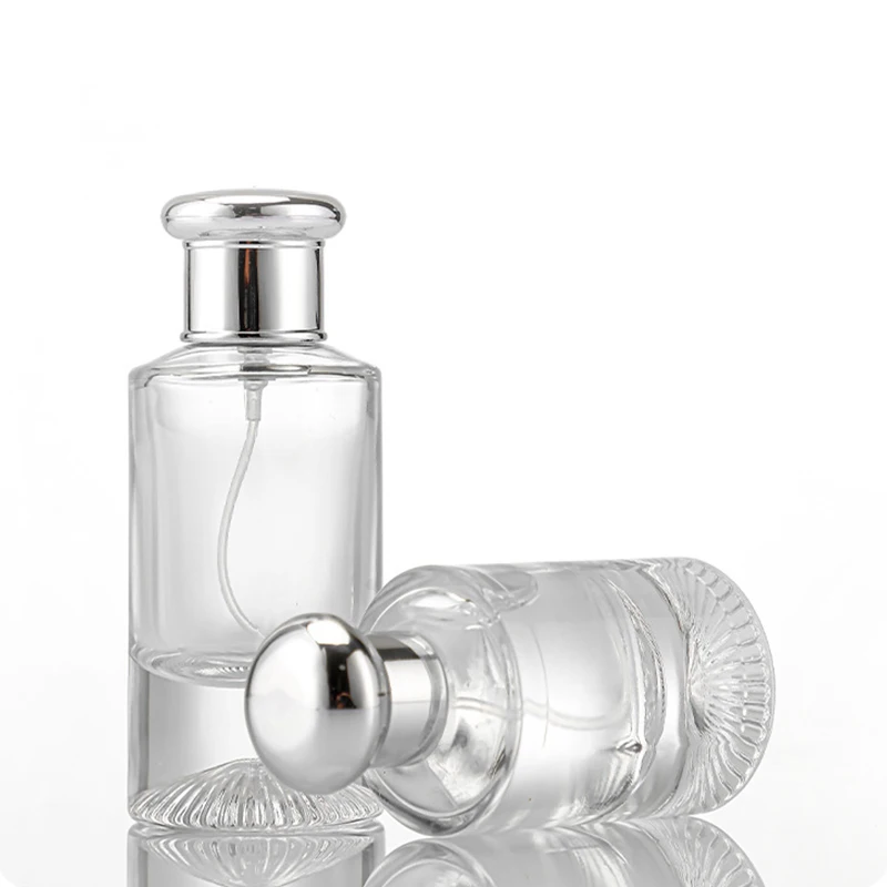 2022 Wholesale Luxury Custom Cyclindrique Empty Spray Pump 25ml 50ml Perfume Glass Bottle