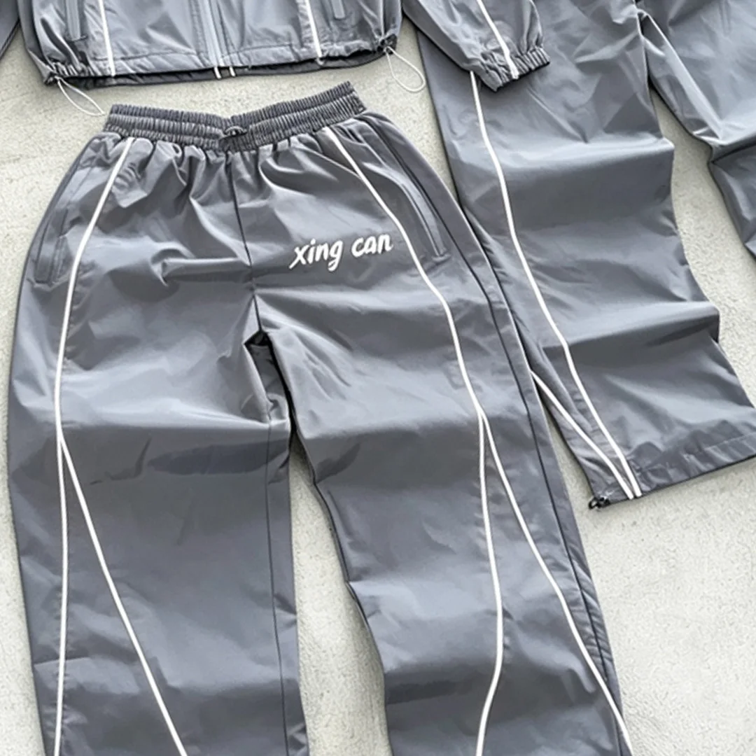 product streetwear factory custom nylon tracksuit with full reflective strips men screen print loose straight leg training suit oem-5