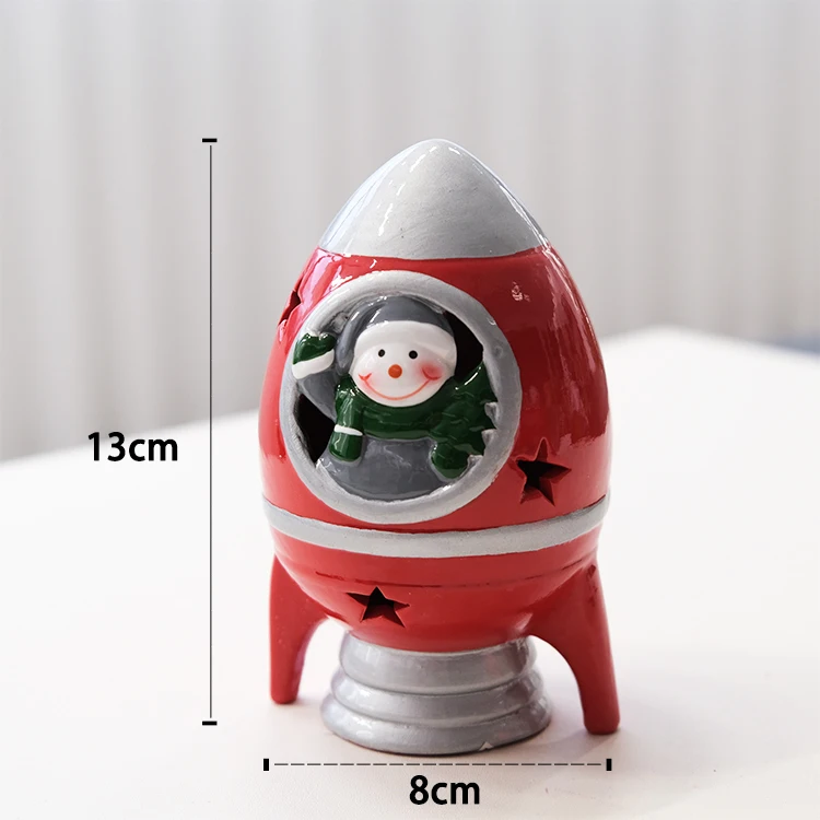 Factory OEM ceramic christmas rocket with snowman figurine ornaments