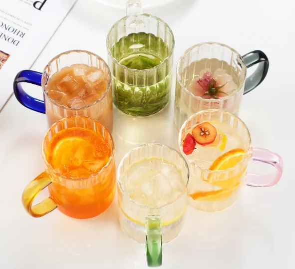 hot selling high borosilicate juice drinking glass mug with colored handle OEM wholesale coffee glass mug