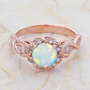 Ruigang 2022 New Arrival Fashion Jewelry Delicate Opal Stone Finger Rose Color Crystal Zircon Ring For Engagement Wedding