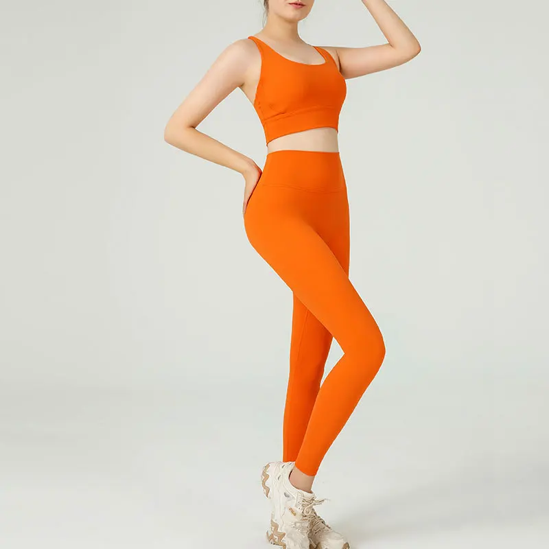Custom new arrival women's solid color cross beauty back sports bra slim fit buttocks yoga leggings yoga suit