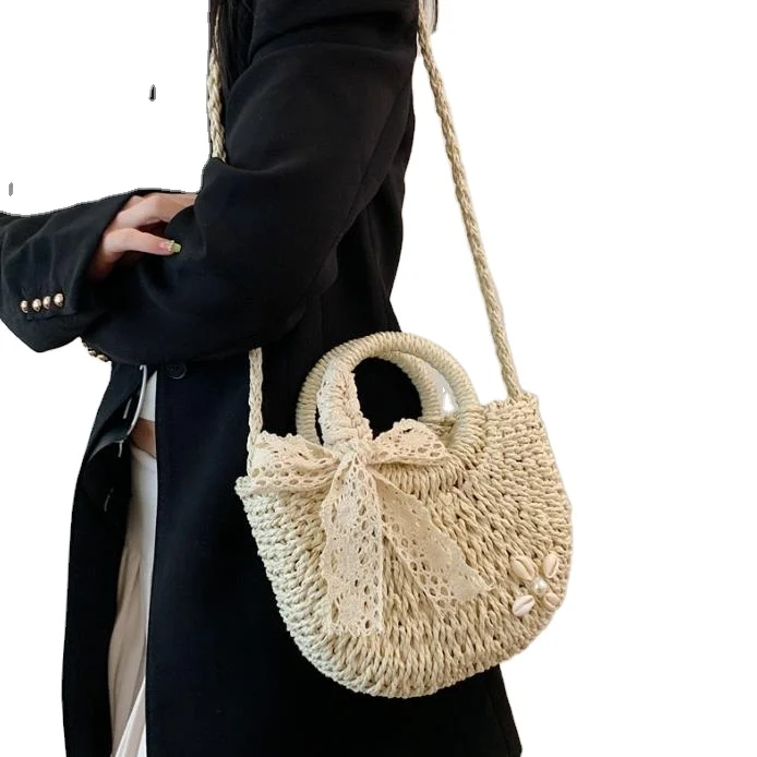 China factory new lace bow hand-woven bag one shoulder portable cross-body straw woven bag