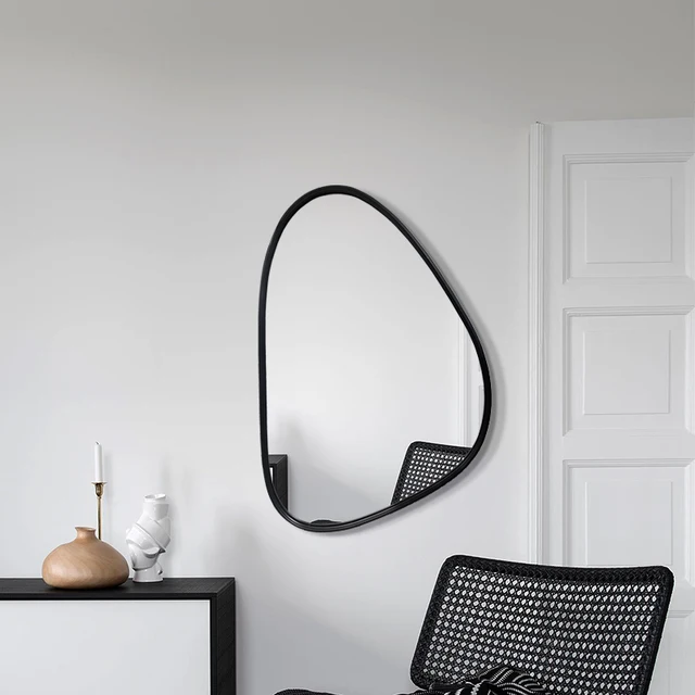 Modern minimalist and unique irregularly shaped wall mounted mirror with iron frame and asymmetrical mirror