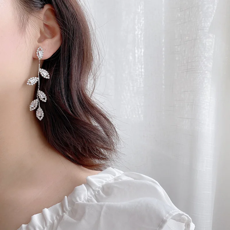 light luxury Leaves earrings temperament Fashion wild earring advanced fashionable long Zircon ear studs