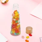 Unique Cone Bulk Empty Elegant Cold Pressing PET Juice Fresh Juice Pyramid Plastic Milk Tea Juice Bottle