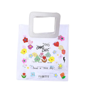 Chinese supplier Transparent PVC handbag gift candy gift handbag plastic bag bouquet packaging bag with ribbon