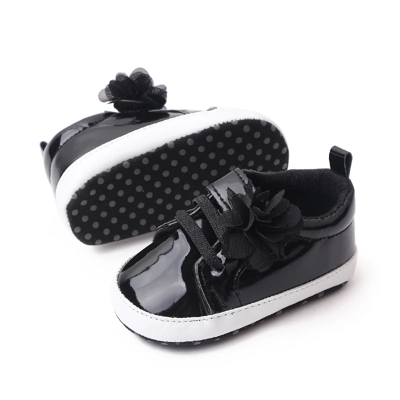 Solid Color Laser Shine Fashion Flower Soft Soled Baby Casual Shoes for Boys and Girls supplier
