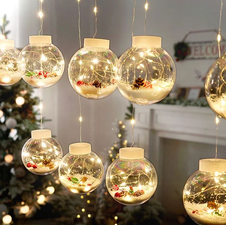 christmas ornaments with lights inside