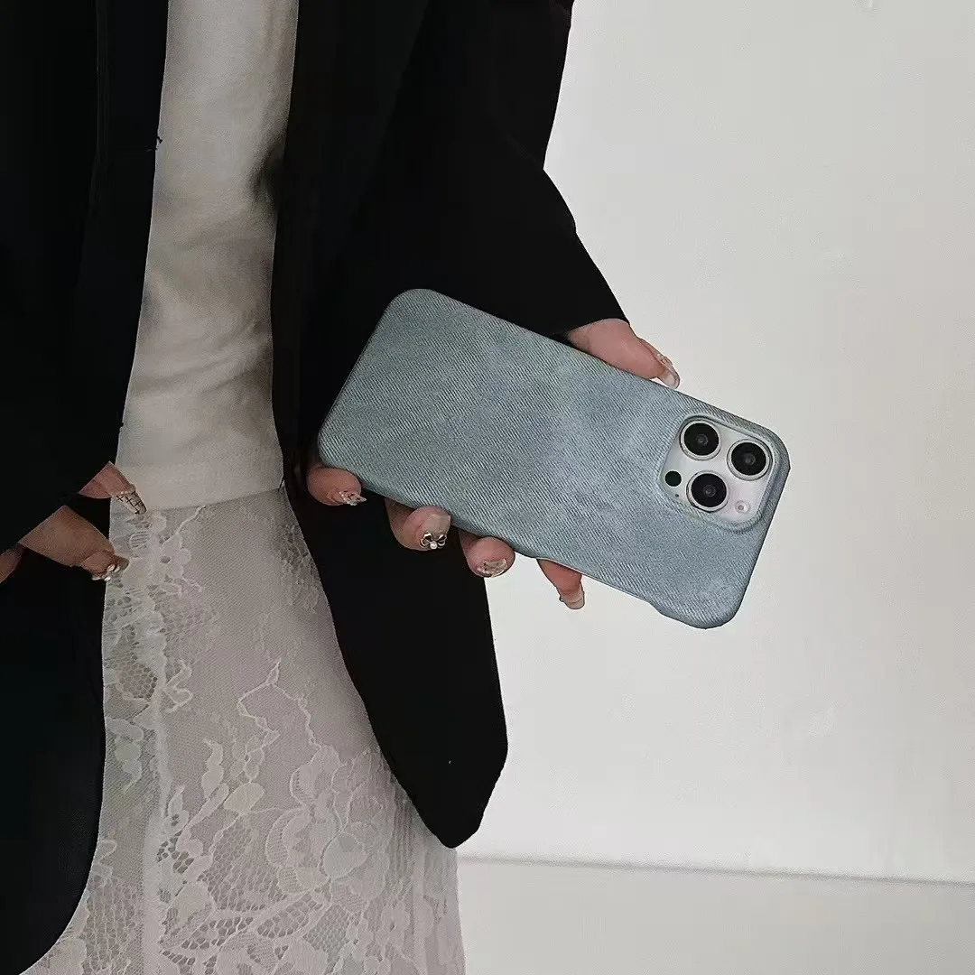iPhone 17 Magnetic Shockproof Fabric Phone Case Light Blue