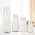 Glass Bottle 100ml 200ml 250ml 500ml ECO Friendly Sealed Juice Milk Tea Glass Bottle With Mental Lid