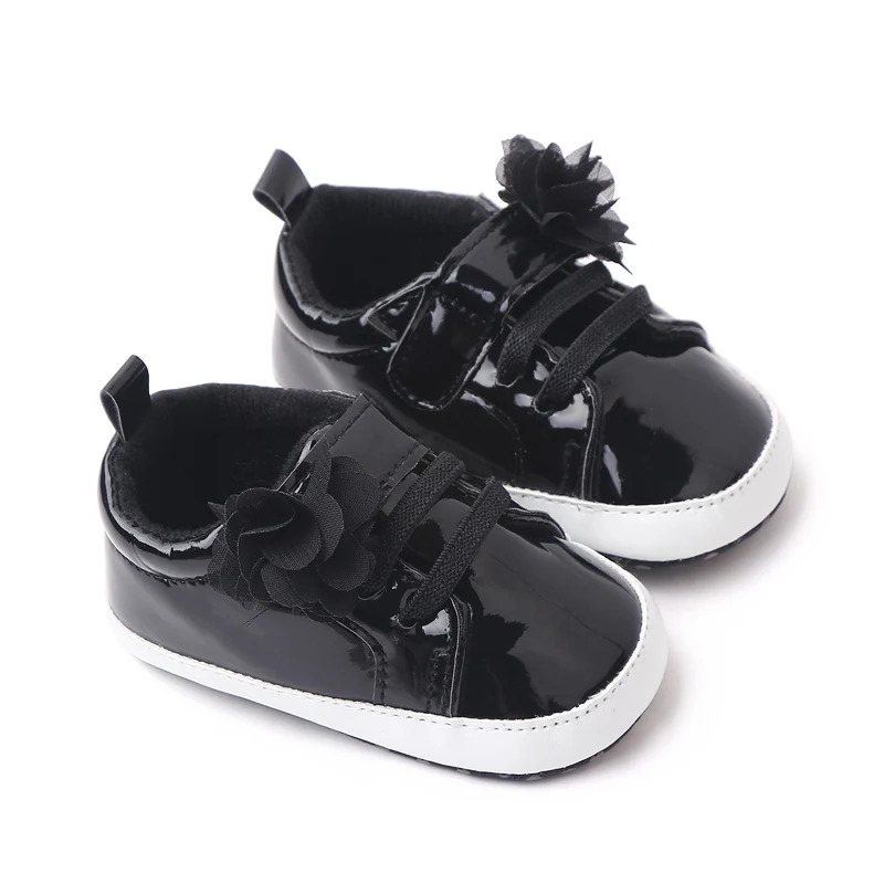 Solid Color Laser Shine Fashion Flower Soft Soled Baby Casual Shoes for Boys and Girls supplier