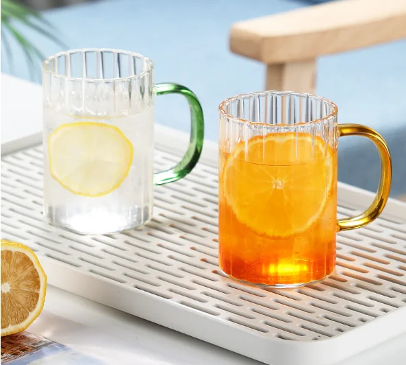 hot selling high borosilicate juice drinking glass mug with colored handle OEM wholesale coffee glass mug