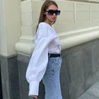 Top Early Spring New Temperament White Shirt Women's French Commuter Top V-neck Pleated Loose Slim Top
