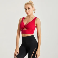 Wholesale One-Piece Cutting Nude Skin Friendly Front Twist Sports Bra High Support Gym Wears For Ladies