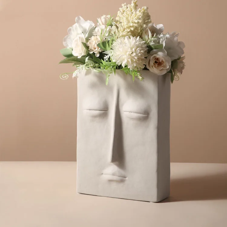 2023 Hot sell Home decor Craft ornament Porcelain Abstract face Creative Modern Flower Vases