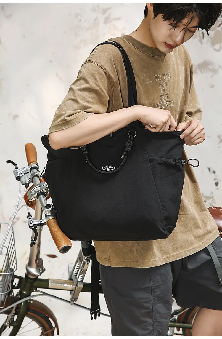 Unisex Large Capacity Lightweight Commuting Shopping Tote Bag Fashionable Casual Zipper Closure Shoulder Bag manufacture