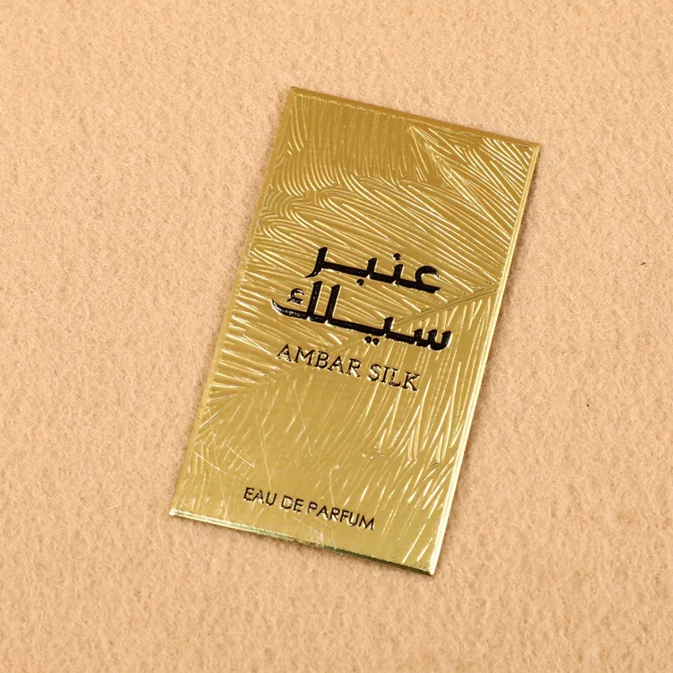 Custom self-adhesive metal logo matte gold embossed stickers perfume bottle labels metallic hang tags Design label