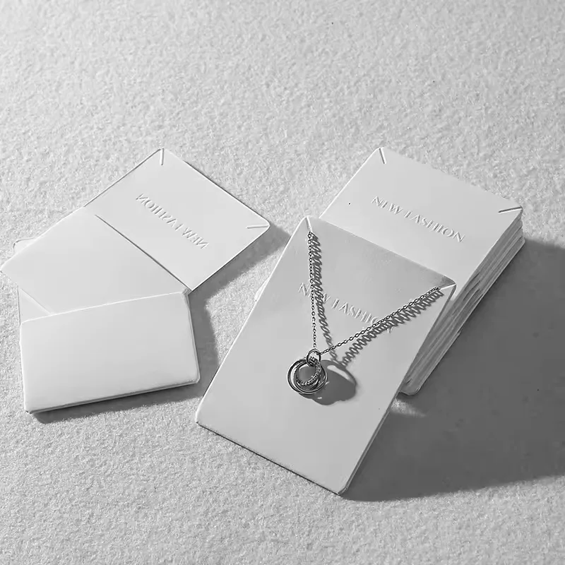 Premium paper jewelry packaging tags Close-up of jewelry display card material texture and construction quality