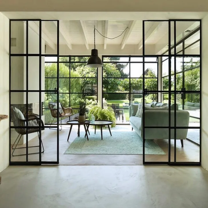 Custom Modern Design Ultra-Thin Double-Layer Glass Sliding Door with Wrought Iron Frame Finished Surface for Hotel/House manufacture