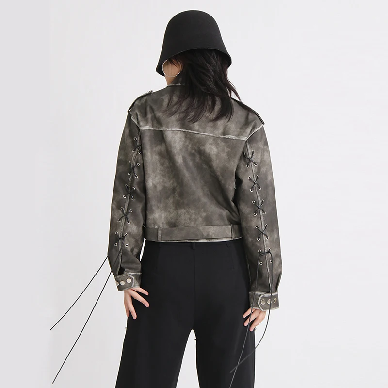 TWOTWINSTYLE New Leather Jacket Patchwork Belt Zipper Pockets Bandage Bowknots Female Fashion 2023