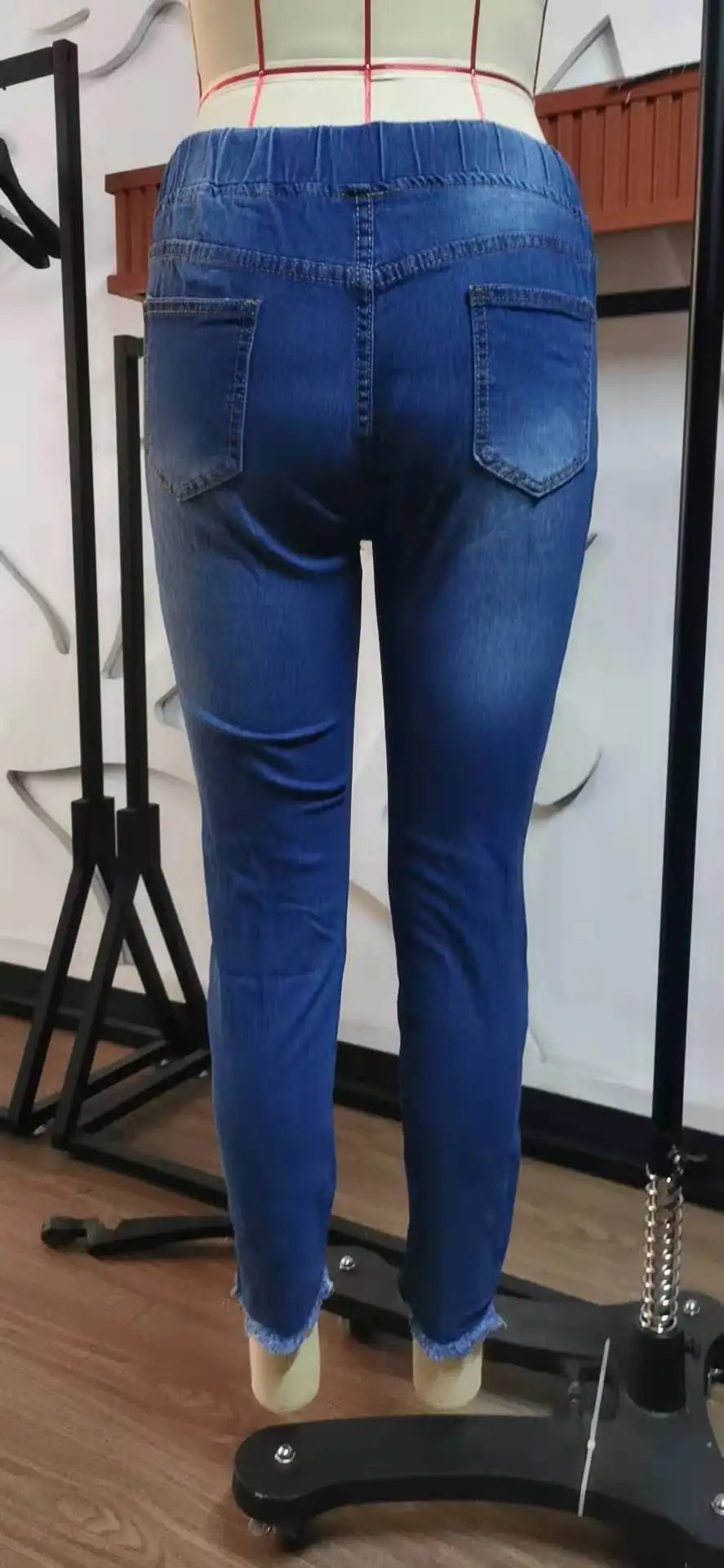 New Arrivals Plus Size Mid Waist Casual Washed Skinny Blue Denim Pencil Pants Ripped Distressed Women's Jeans manufacture