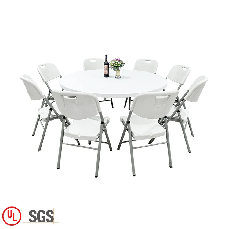 white round folding table and chairs