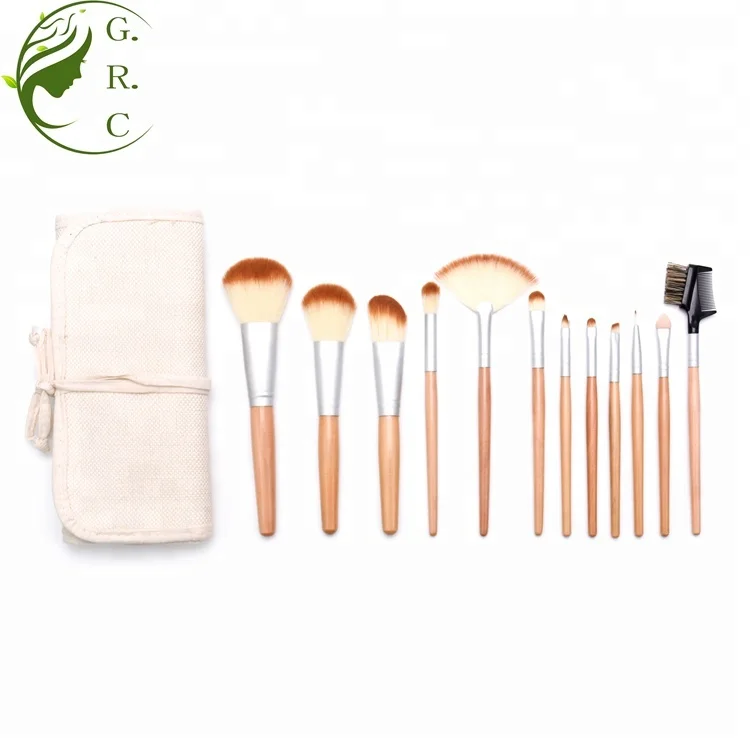 Professional Private Label Low Moq Women Themed Vegan Natural Bristles Wooden Hand makeup Brush Set With Wrap Canvas Bags