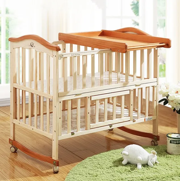 attachable cot to bed