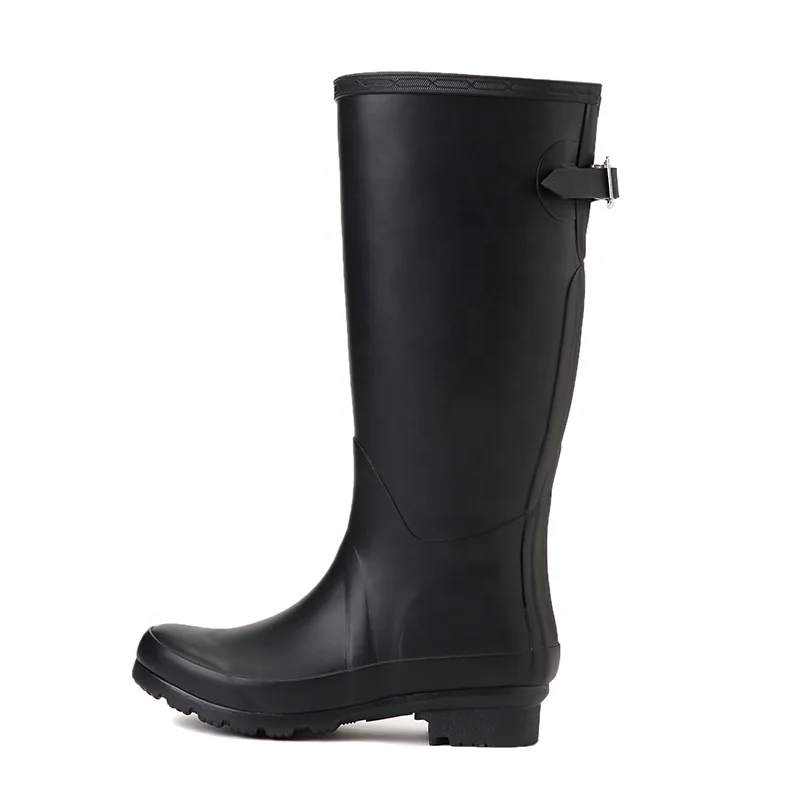 black rubber boots with buckles