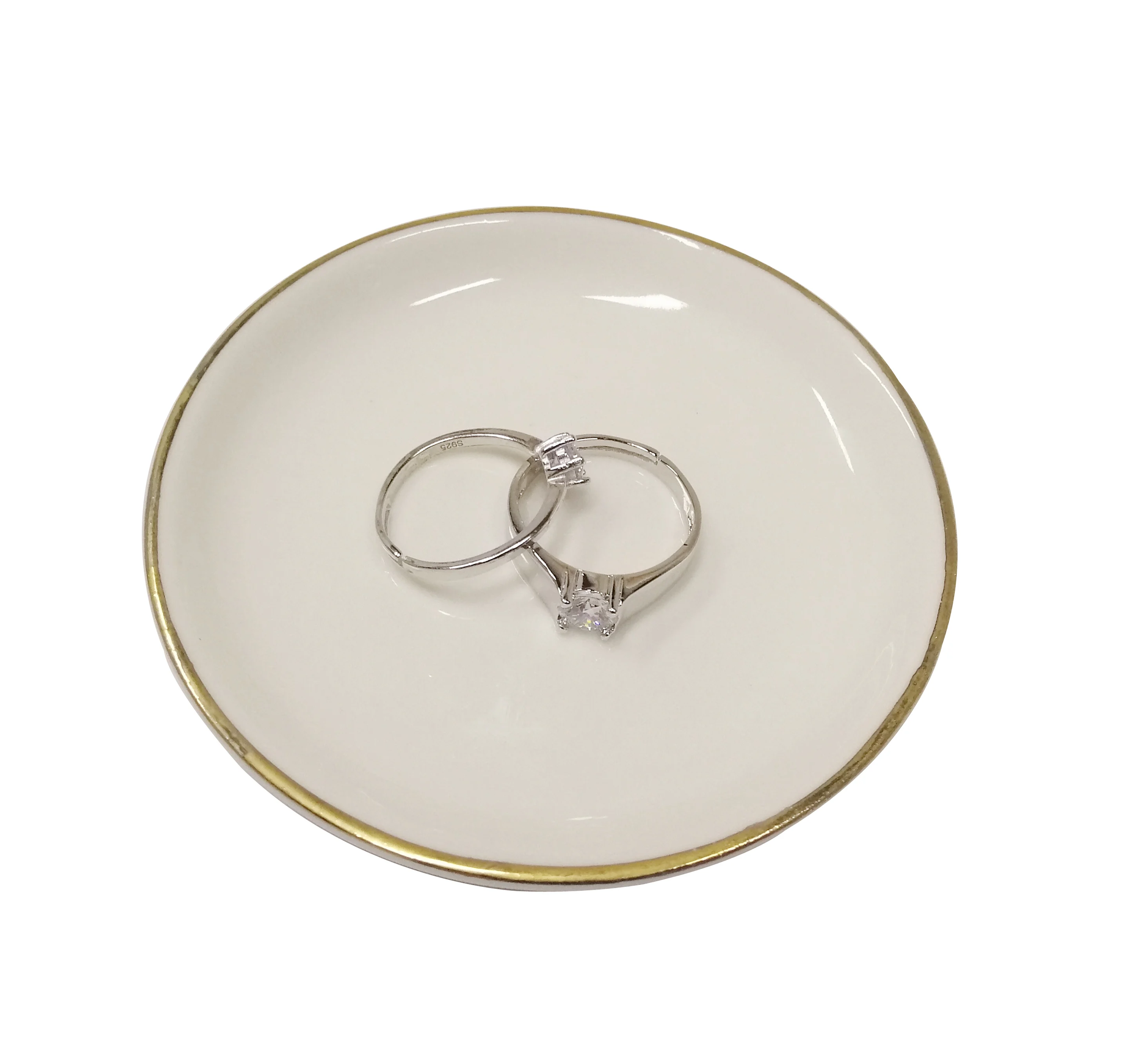 white ceramic ring dish