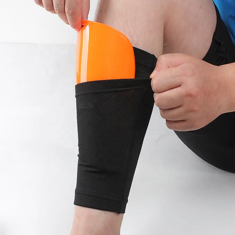 orange shin guard stays