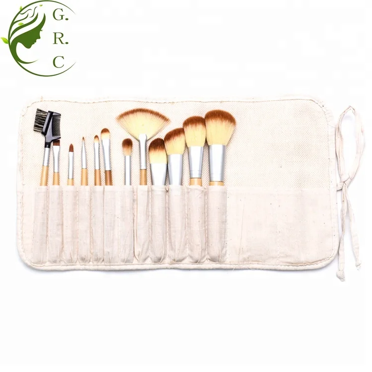 Professional Private Label Low Moq Women Themed Vegan Natural Bristles Wooden Hand makeup Brush Set With Wrap Canvas Bags