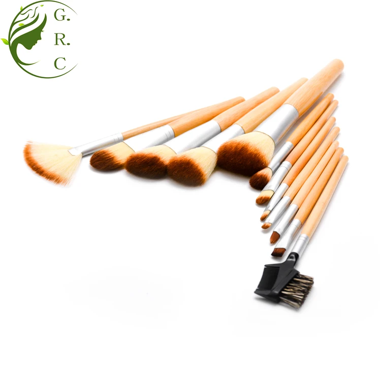 Professional Private Label Low Moq Women Themed Vegan Natural Bristles Wooden Hand makeup Brush Set With Wrap Canvas Bags