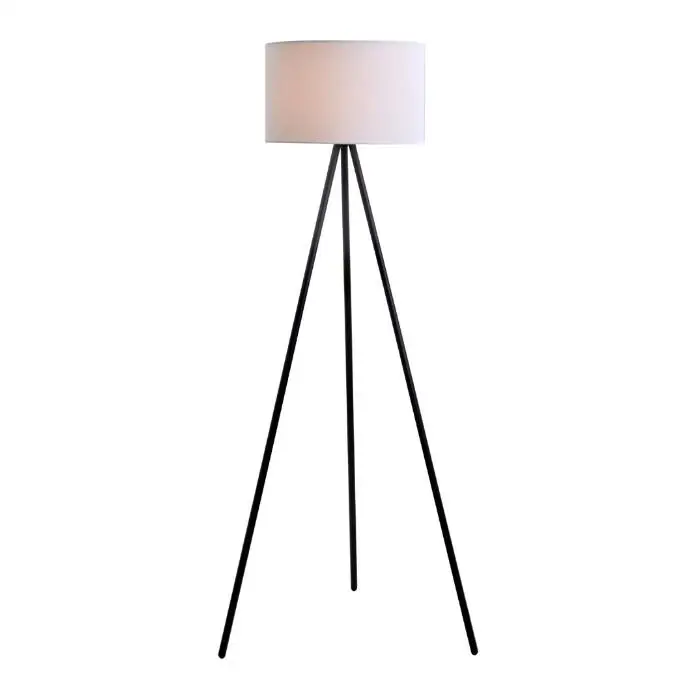 black tripod floor lamp with white shade