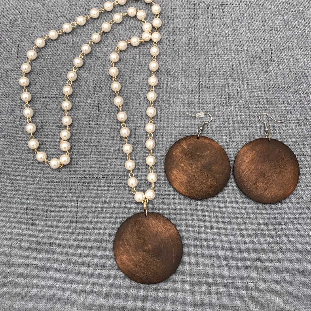 pearl necklace with monogram pendant