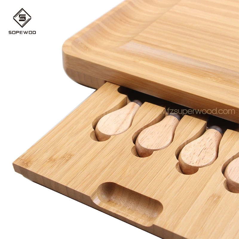 SOPEWOD 100% Natural Bamboo Cheese Board & Cutlery Set with Slide-Out Drawer and knife
