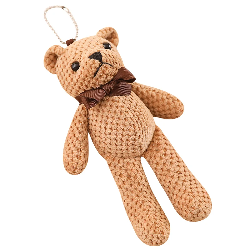teddy bear hanging from car