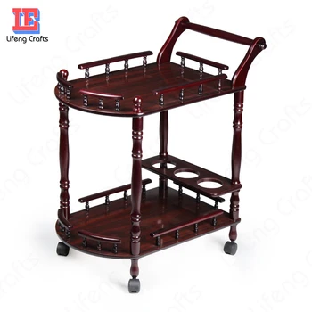 Antique and elegant design wood serving trolley with wine bottle rack and cart wheels for home hotel and restaurant room service