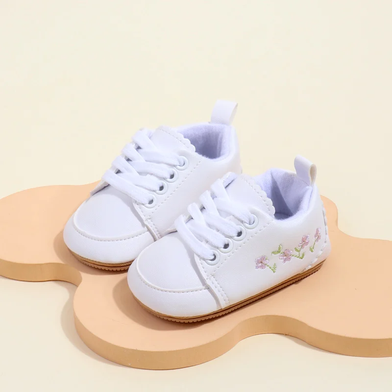 High Quality Soft Leather Baby Girl Toddler Casual Shoes Newly Arrived with Embroidered Flower Design and Non-Slip Rubber Bottom details