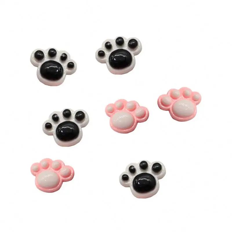 why do dogs paws go from pink to black